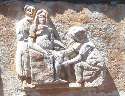 Roman birthing chair and midwife from plaque in Ostia