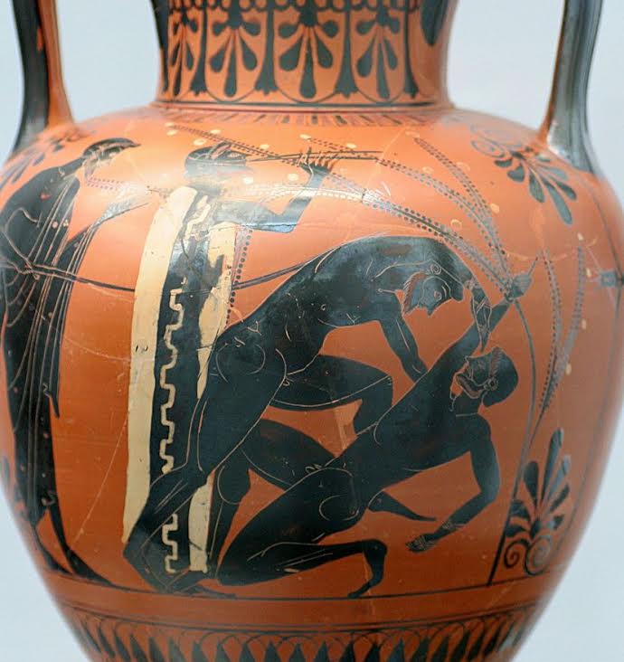 vase showing boxing match with musical accompaniment and judge